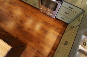 green-kitchen-cabinets-hardwood-floor-south-falls-construction          